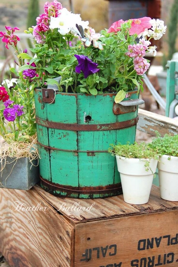 Ways to Create a Gorgeous Outdoor Area with Repurposed Containers