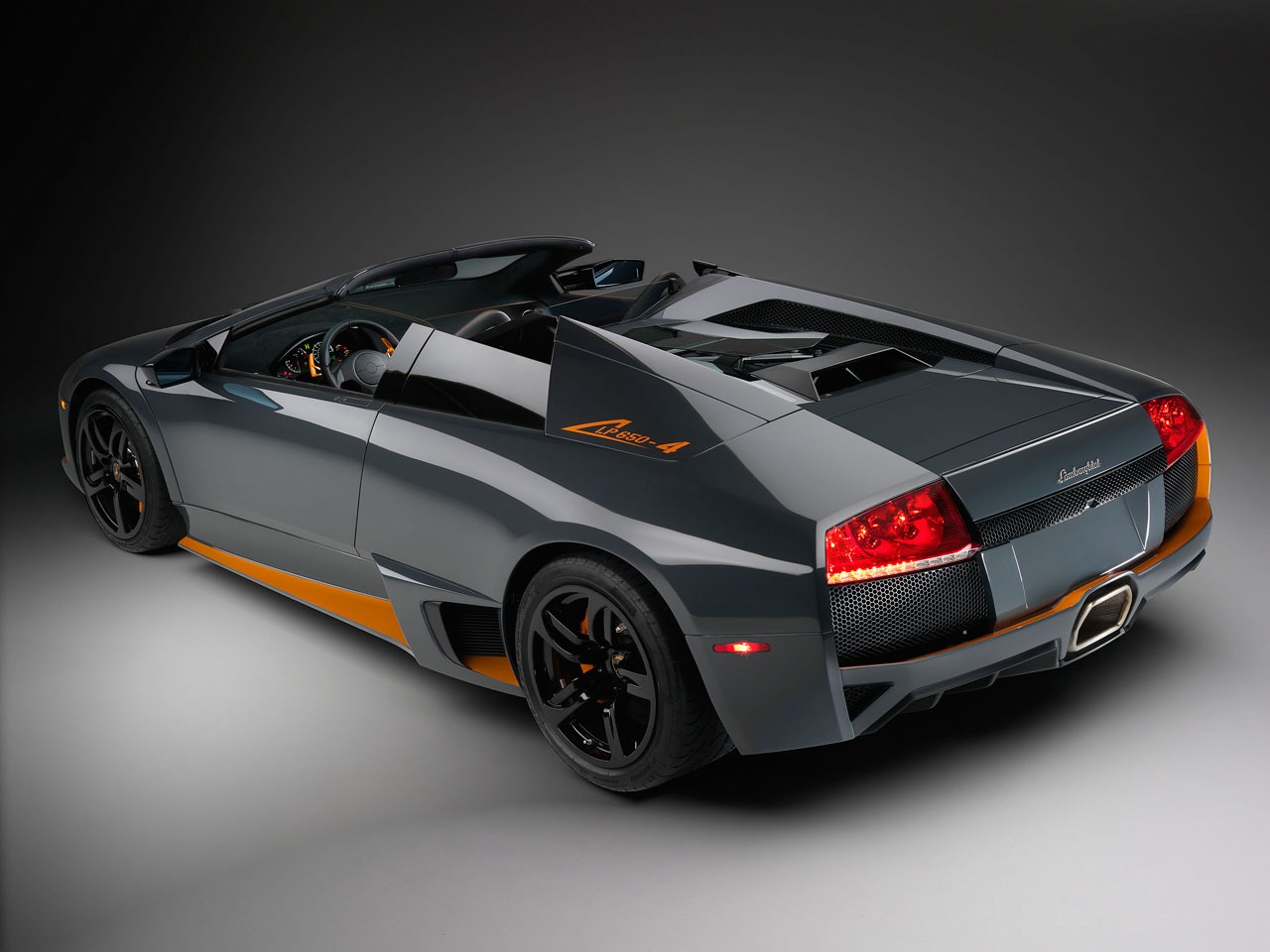 Indulge in the Exceptional Artistry and Thrill of the 2010 Lamborghini Murcielago LP650-4 Roadster fb - DX