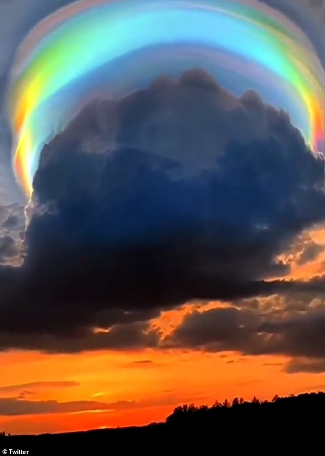 The rainbow rain cloud: Incredible natural occurrence looms over Chinese city like a multi-coloured halo - Breaking International