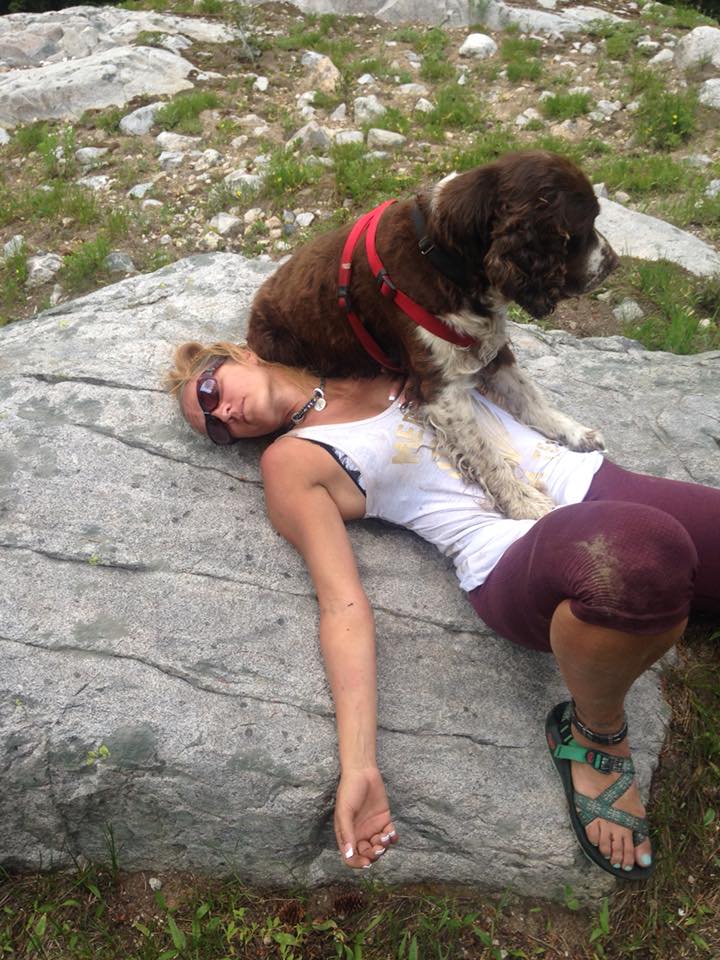 A woman shows incredible strength and compassion by carrying a 55-pound injured dog on her shoulders down a mountain for six hours, demonstrating the lengths we will go for animals in need. - Lillise