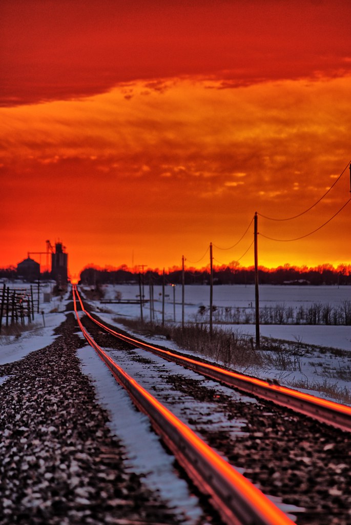 The Celestial Illusion: Entrancing the Senses with the Annual Dance of Sunlight on Railroad Tracks