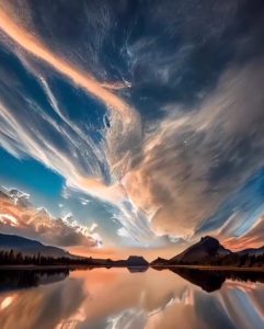 A Majestic Masterpiece: The Reflective Symphony of Luminous Clouds on a Mighty River