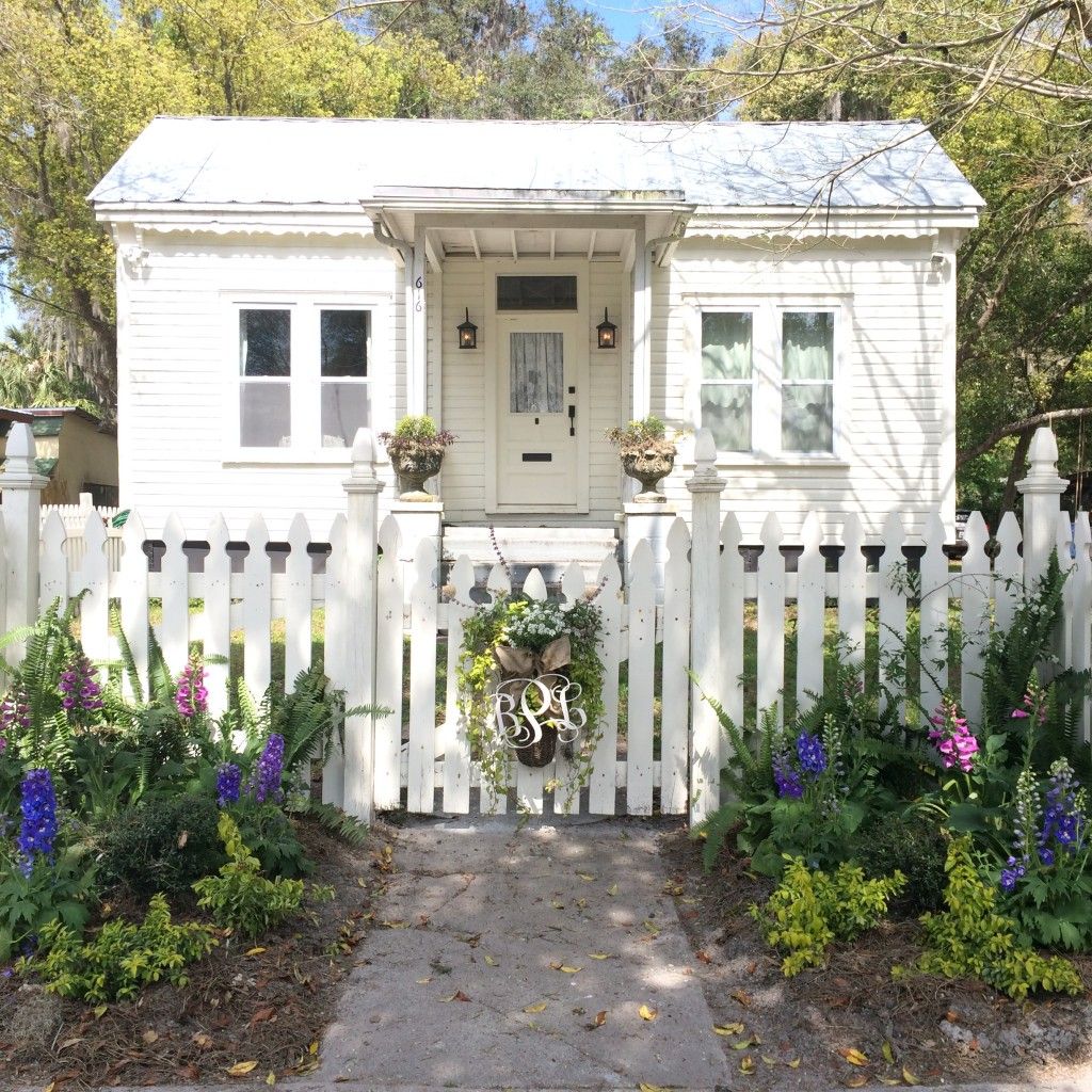 Envelop Yourself in the Enchanting Beauty of a Delightful White Wooden Cottage, Overflowing with Simplicity and Serenity in California