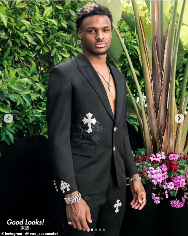 LeBron James plays the role of doting dad as he and wife Savannah watch son Bronny graduate from high school - Sports News