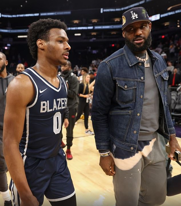 LeBron James plays the role of doting dad as he and wife Savannah watch son Bronny graduate from high school