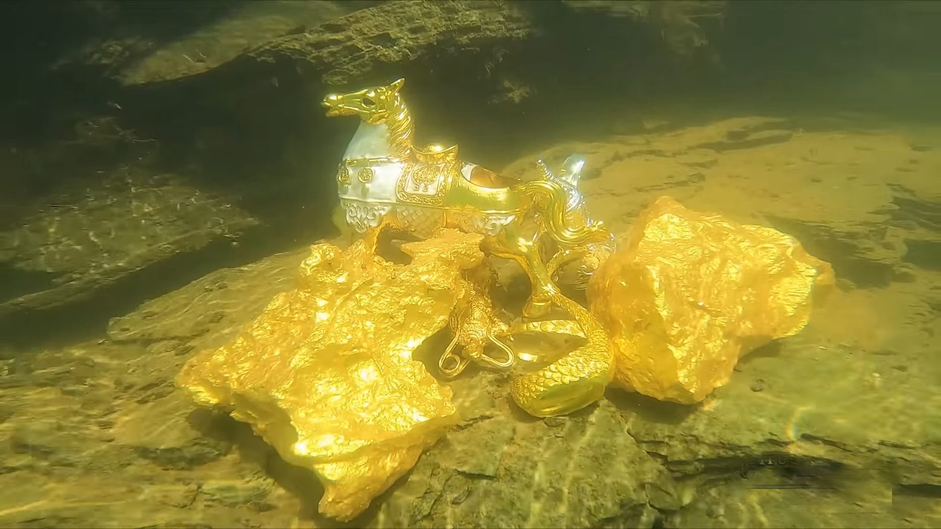 "Unveiled Enigmas: Discovery of Ancient Gold Utensils and Pharaoh's Bust Emerging from Riverbed"