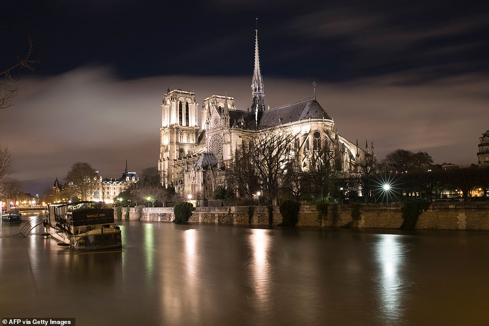 Ancient tombs and a leaden sarcophagus dating back to the 14th century are uncovered at Paris' Notre Dame during work to rebuild the cathedral following damage from the 2019 fire - T-News