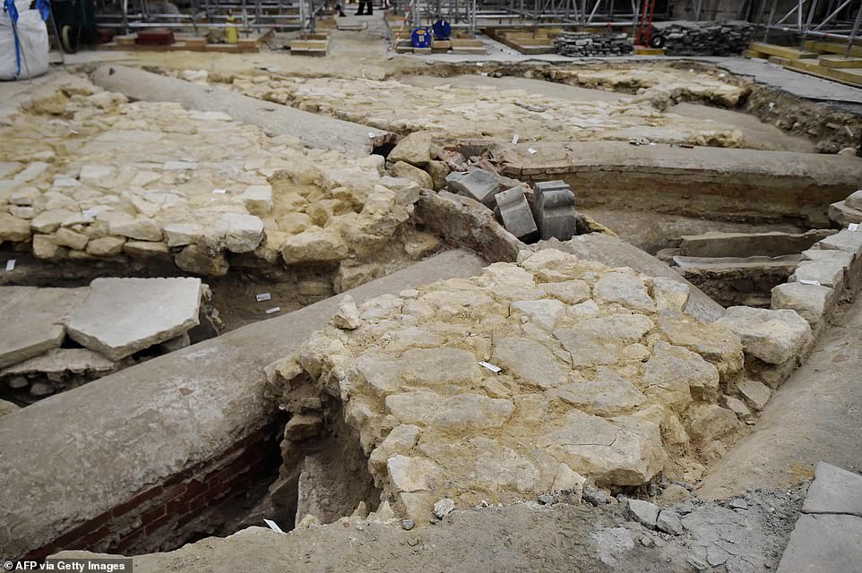 Ancient tombs and a leaden sarcophagus dating back to the 14th century are uncovered at Paris' Notre Dame during work to rebuild the cathedral following damage from the 2019 fire - T-News