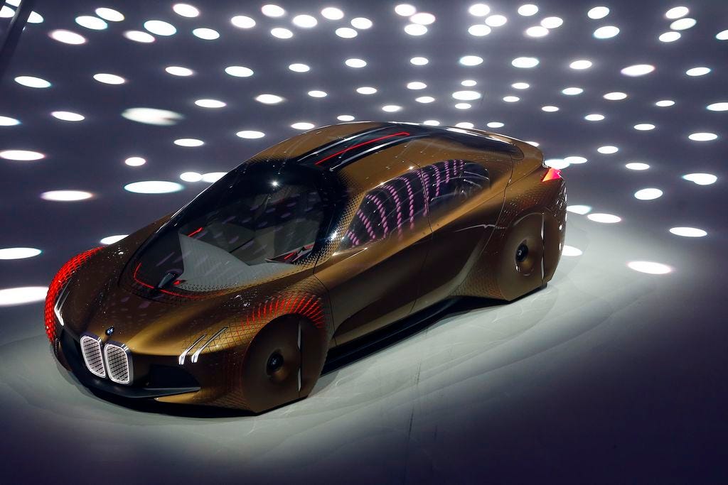 The Future of Automobiles: BMW Unveils Shape-Shifting Concept for Self-Driving and Sports Car Transformation - amazingmindscape.com