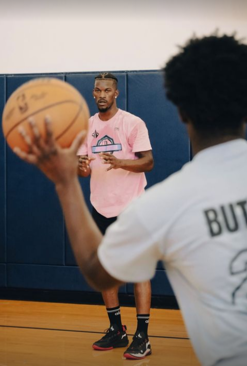 PHOTO GALLERY: Miami star Jimmy Butler shares the joy of inspiring basketball for kids at training camp in South Florida