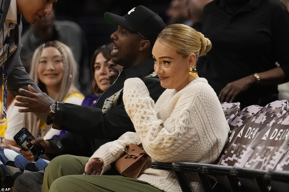 The newlyweds! After 'confirming' her marriage to Rich Paul, Adele radiated at the Lakers game