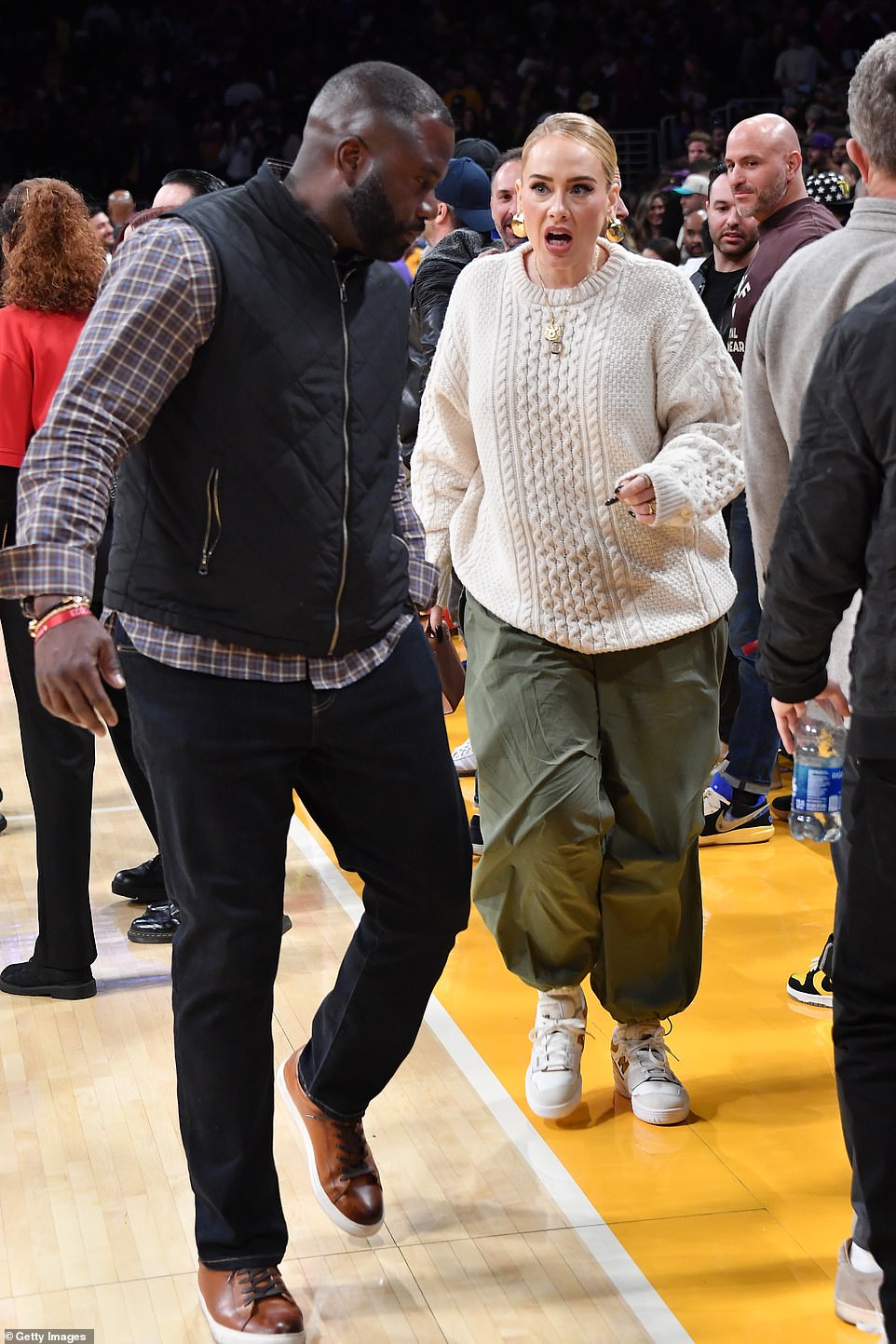 The newlyweds! After 'confirming' her marriage to Rich Paul, Adele radiated at the Lakers game