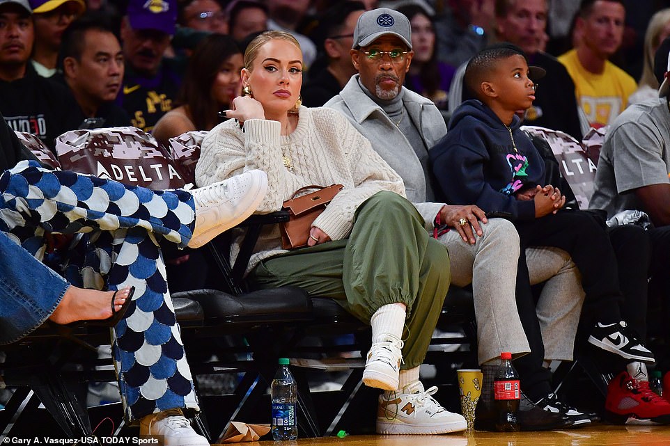 The newlyweds! After 'confirming' her marriage to Rich Paul, Adele radiated at the Lakers game