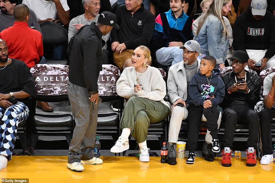 The newlyweds! After 'confirming' her marriage to Rich Paul, Adele radiated at the Lakers game