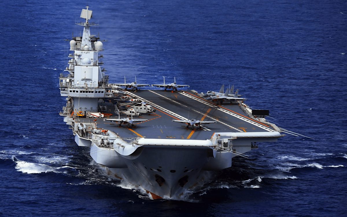 Look at To commemorate its birthday, China's first aircraft carrier, the Liaoning, is in route with 24 J-15 jets.