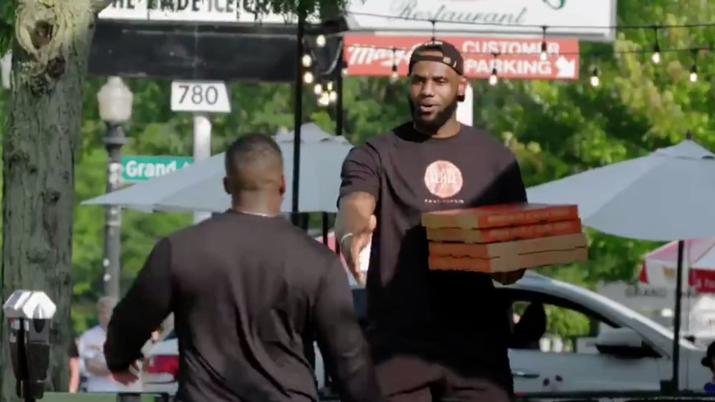 LeShip! Lakers’ LeBron James holds Pizza on the street while ‘GOAT’ pretending to be a delivery guy