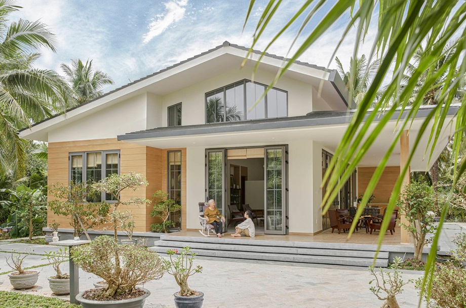 House in a simple garden, emphasizing a warm family space