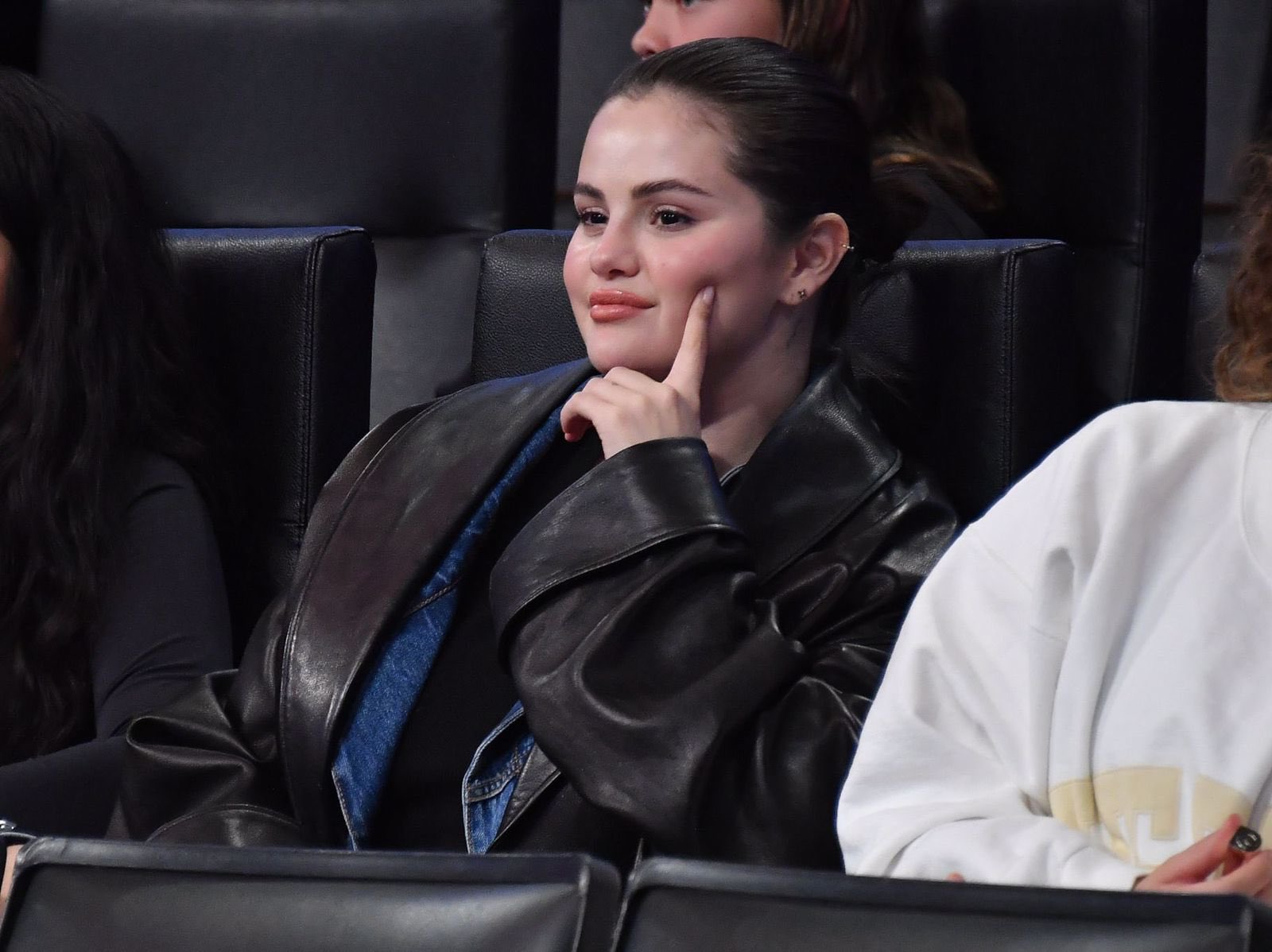 Lakers Angels! Selena Gomez shows off her cute smile while at a Los Angeles Lakers game with family and friends