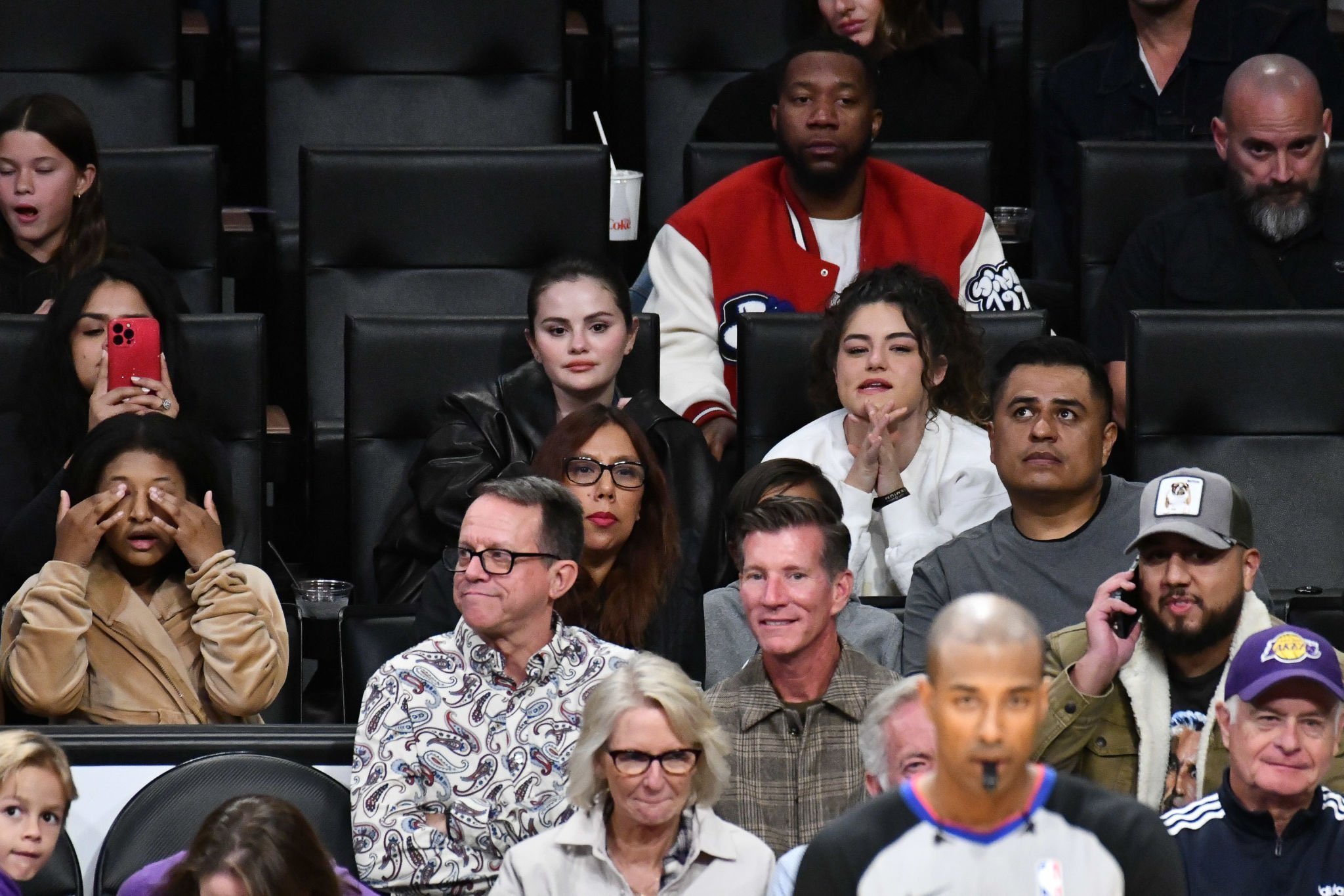 Lakers Angels! Selena Gomez shows off her cute smile while at a Los Angeles Lakers game with family and friends