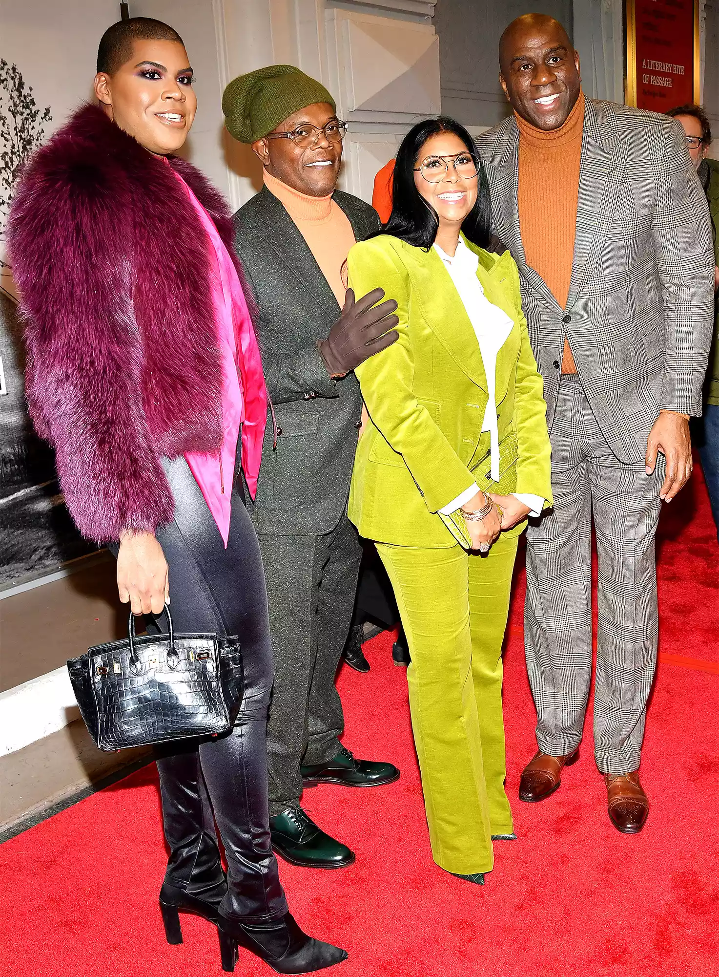 Magic Johnson, an NBA legend, and his family, including son EJ, walked the red carpet in New York