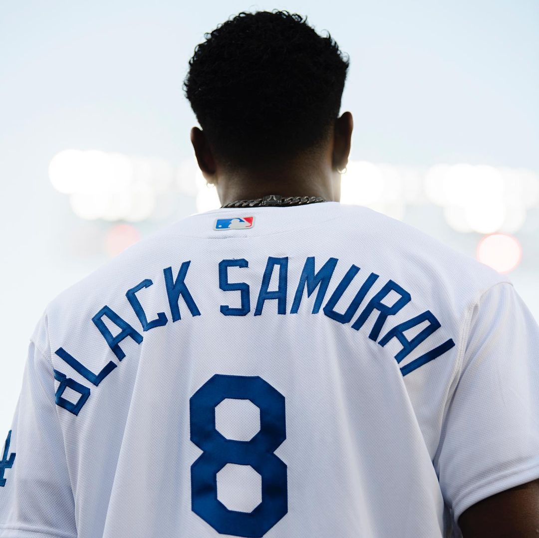 Rui Hachimura at a baseball game with the LA Dodgers, surrounded by family joy to welcome Shohei Ohtani