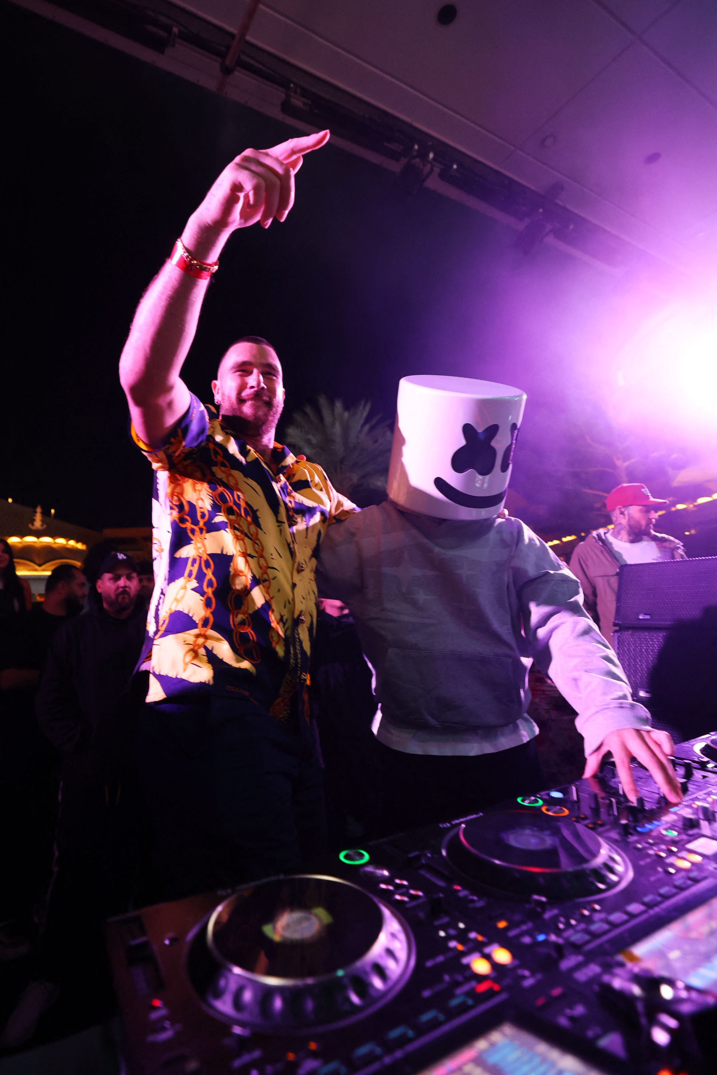 The tight end was also spotted jamming with DJ Marshmello during his set