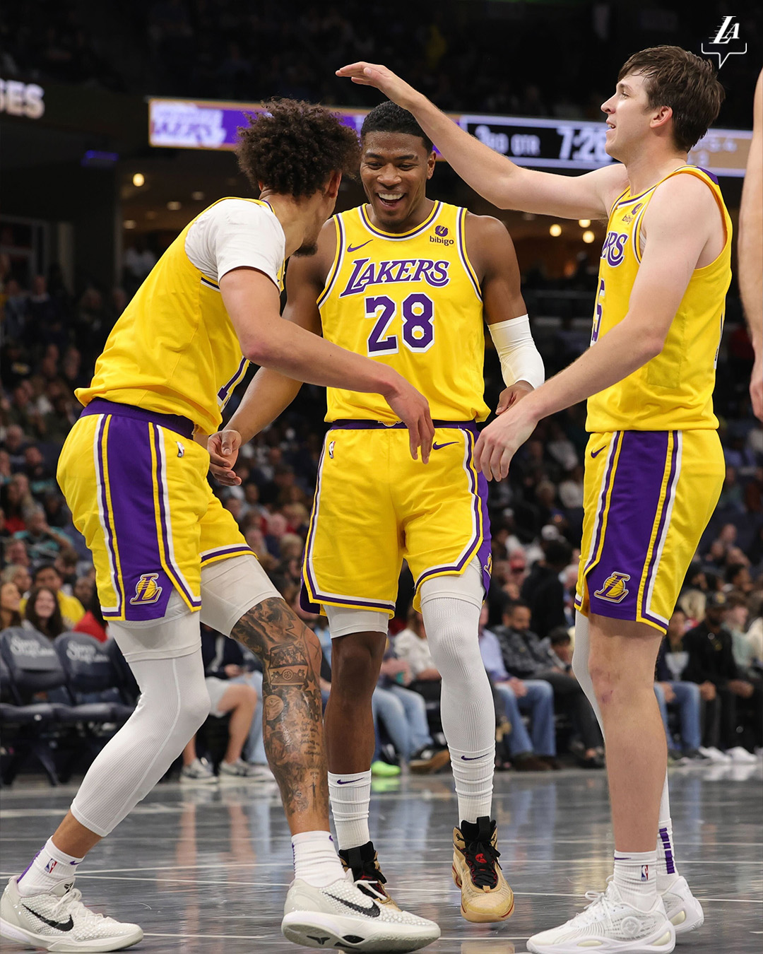 May be an image of 3 people, people playing basketball, crowd and text