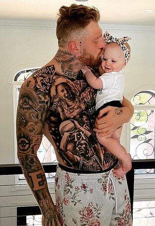 Maxx Crosby with his daughter