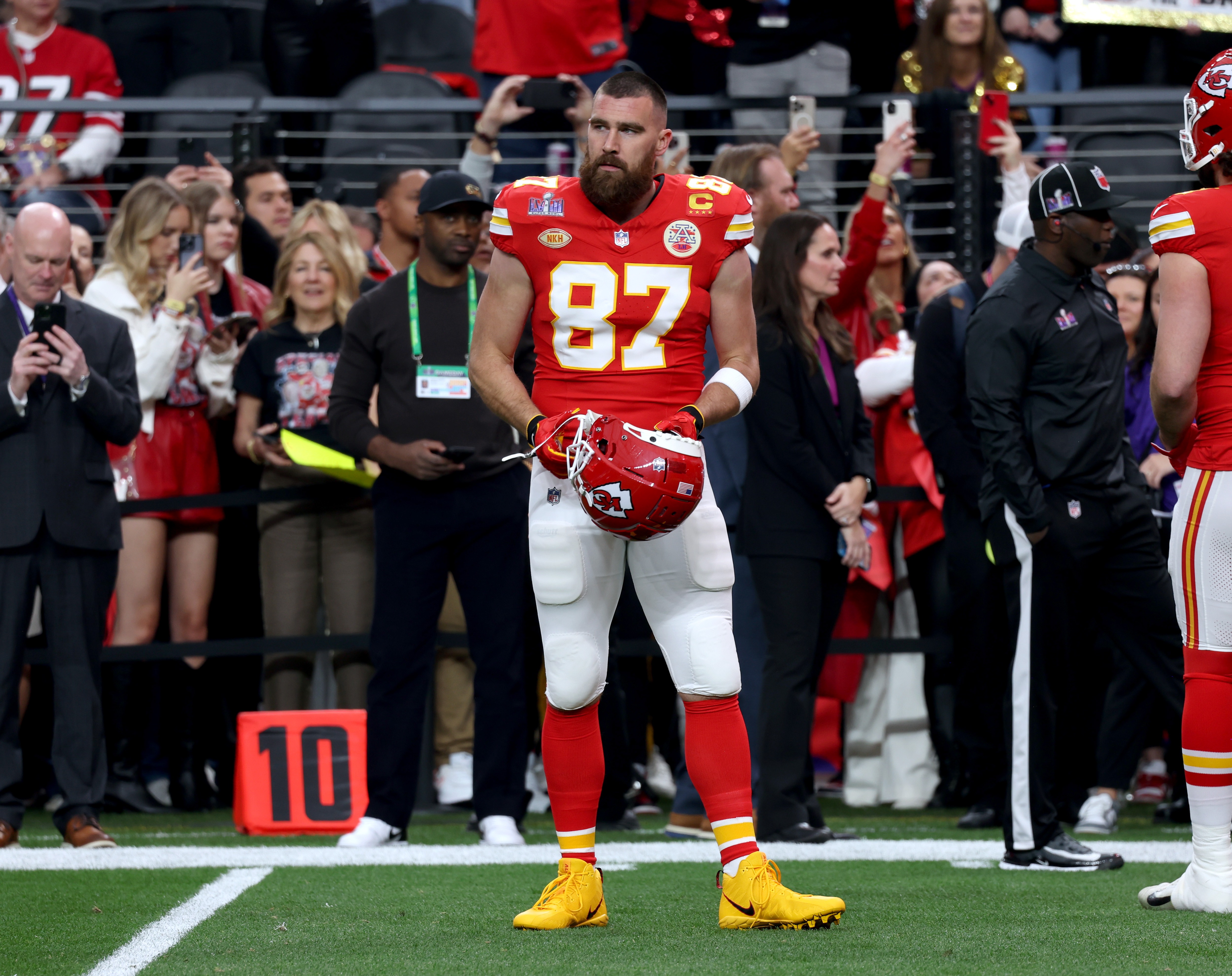 Travis Kelce on a football field.