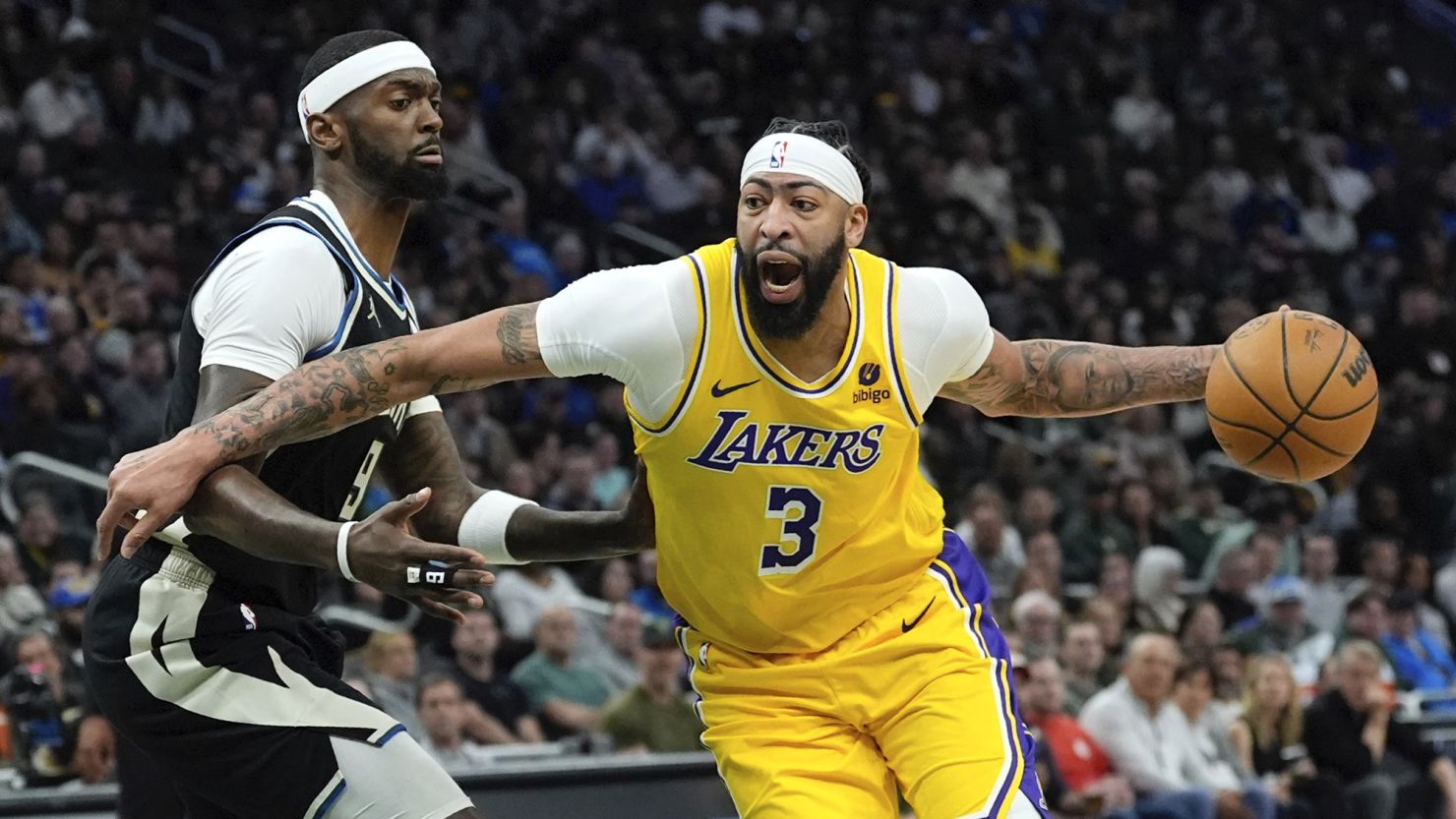 Anthony Davis and Austin Reaves power LeBron-less Lakers to big fourth-quarter comeback and double-OT road victory over Bucks | CNN