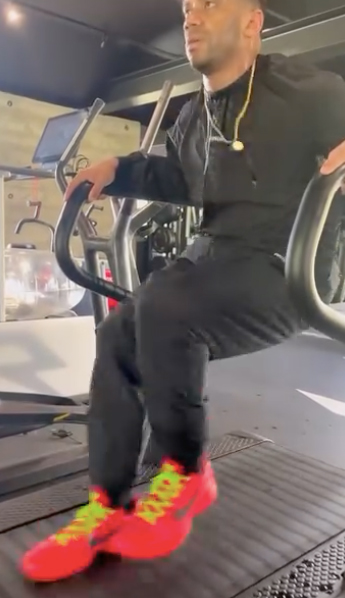 Wilson performs a reverse treadmill exercise