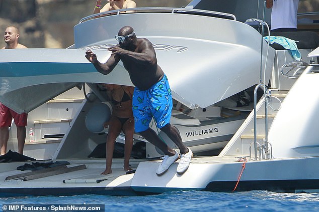 Diving: The star showed off his diving skills by jumping into the water with his shoes on