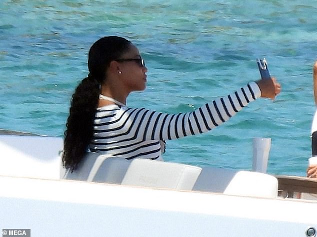 Ayesha snapped a selfie as she lounged on the boat alongside her husband